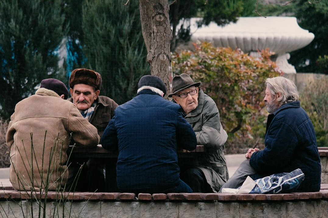 elderly and young people together
