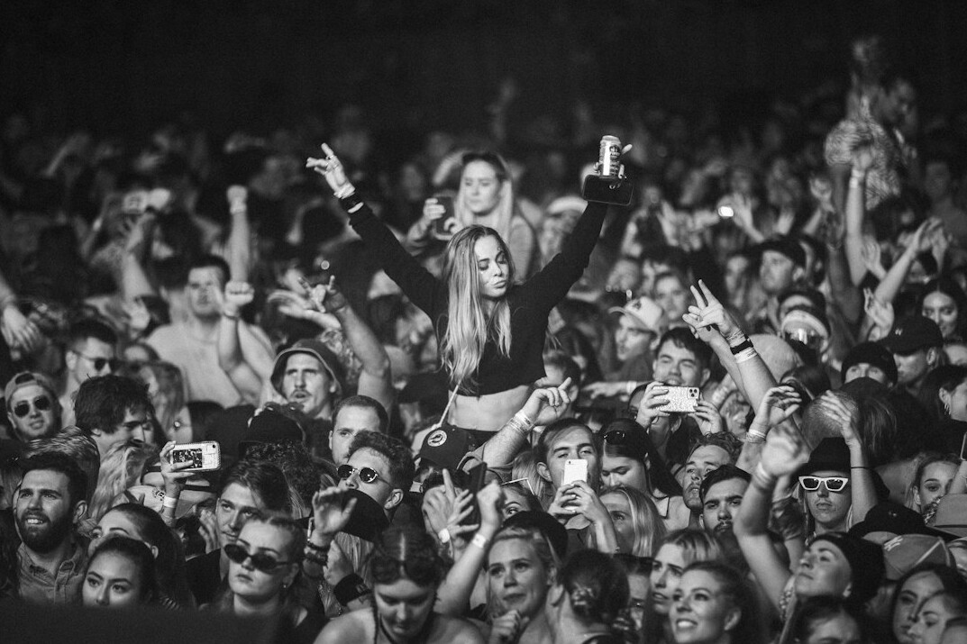 crowd watching viral video